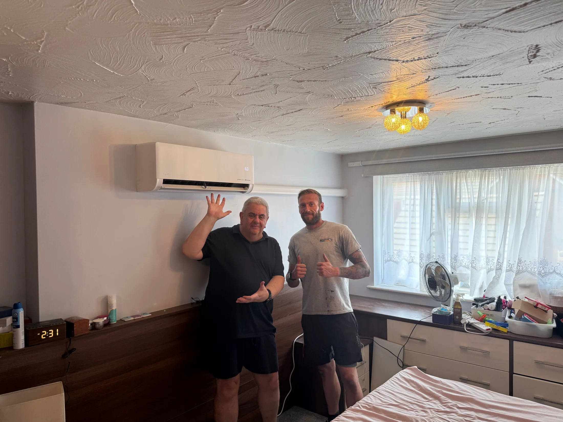 Customer with Sam after an air conditioning install