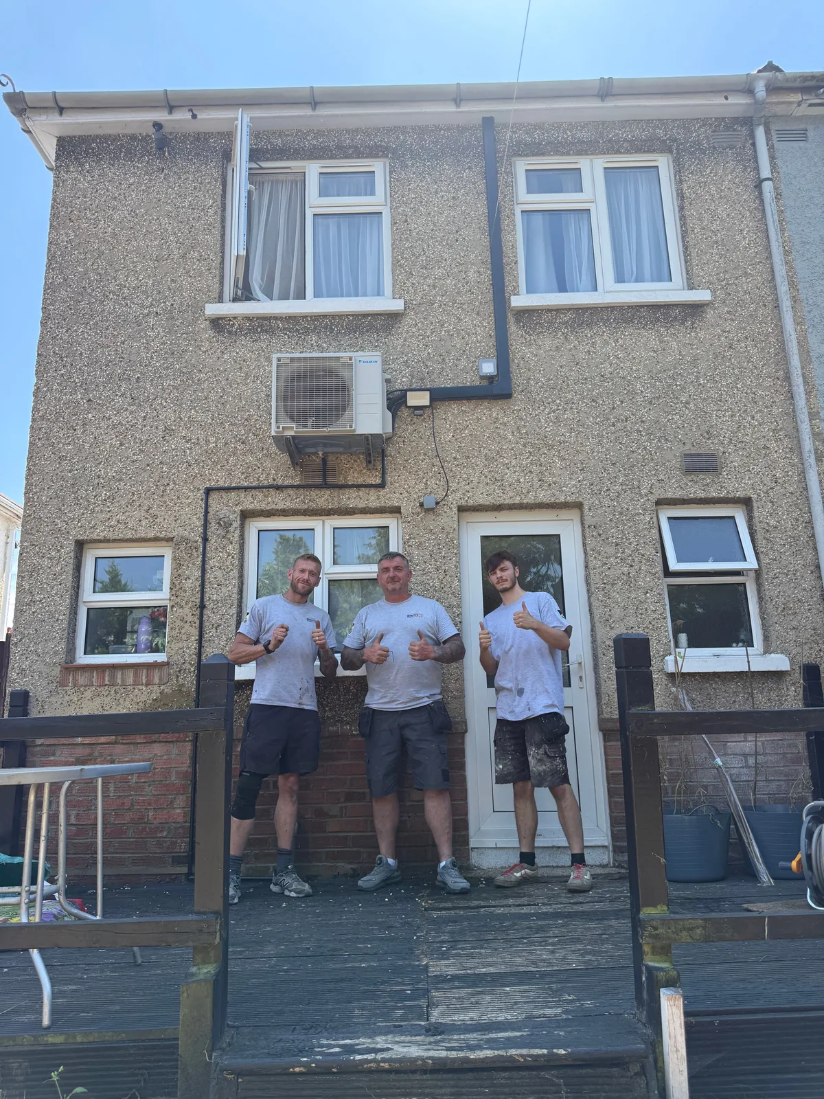 The Becketts Plumbing & Heating team of three after a Daikin air conditioning installation in Southampton
