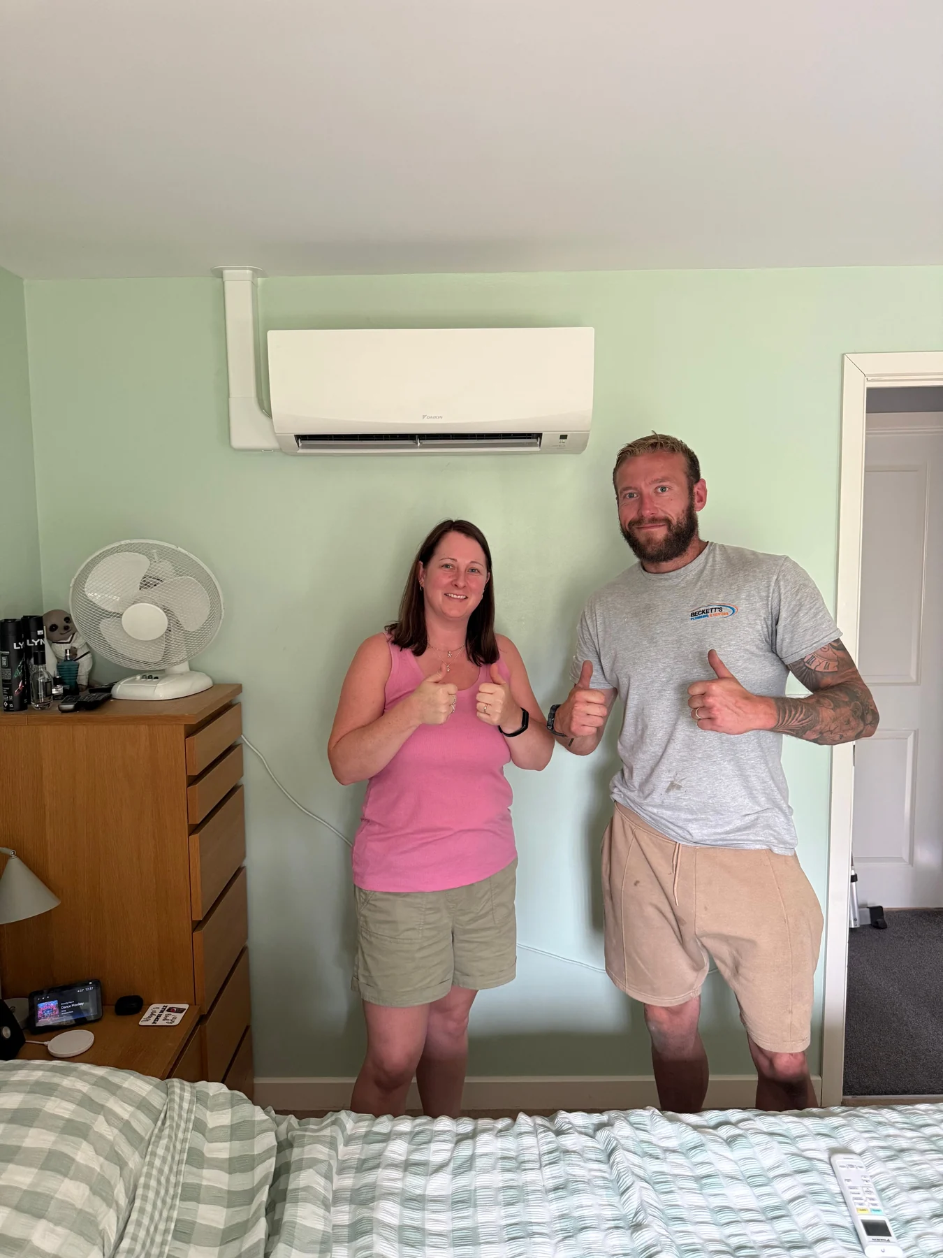 Happy customers after a Becketts Plumbing & Heating installation