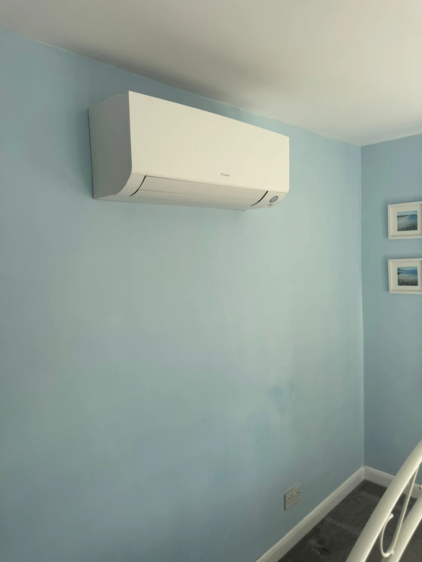 Wall-mounted air conditioning unit installed in a Southampton home