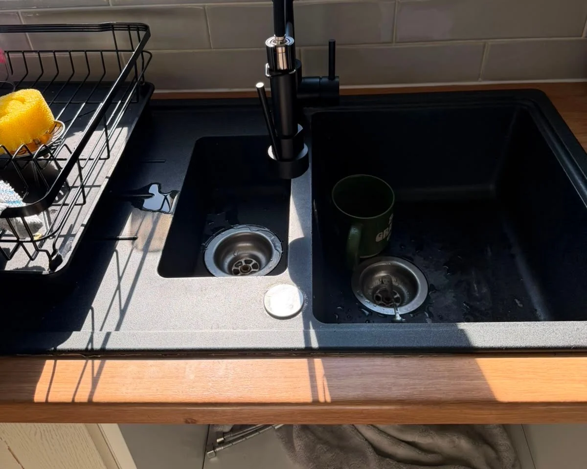 New black kitchen tap fitted on a granite sink in Southampton